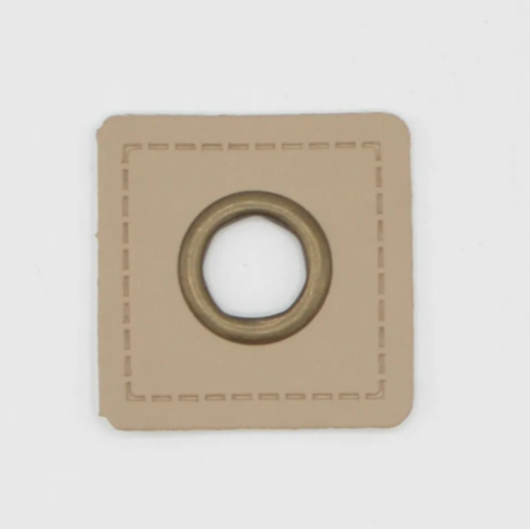 Image de 2 Œillets 9 mm sur cuir - Beige